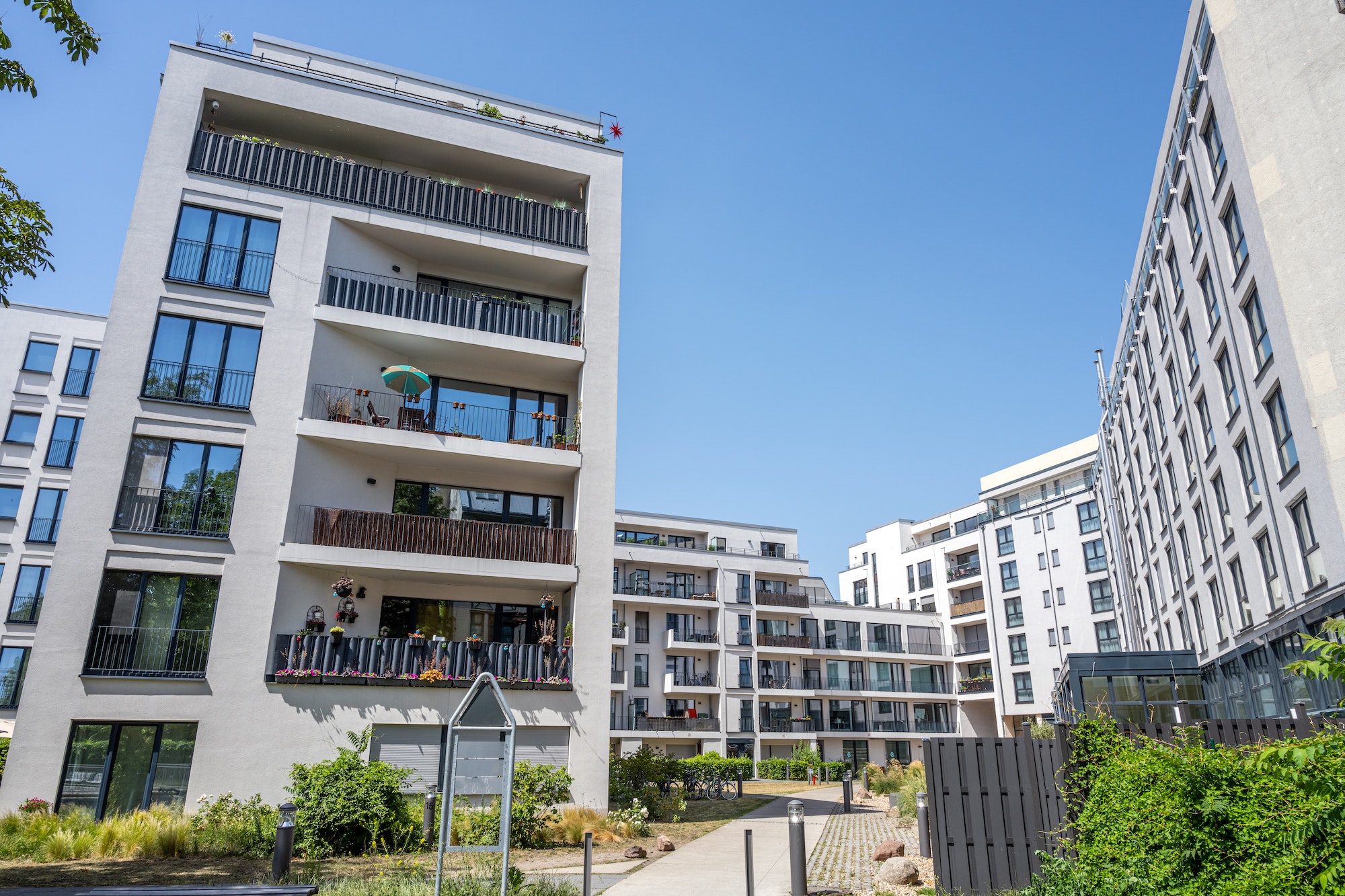 new apartment buildings in a housing development area 1